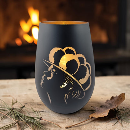 Schwarzwald Gravur black glass windlight with engraved silhouette of a woman in a hat, gold interior. Made in Germany.